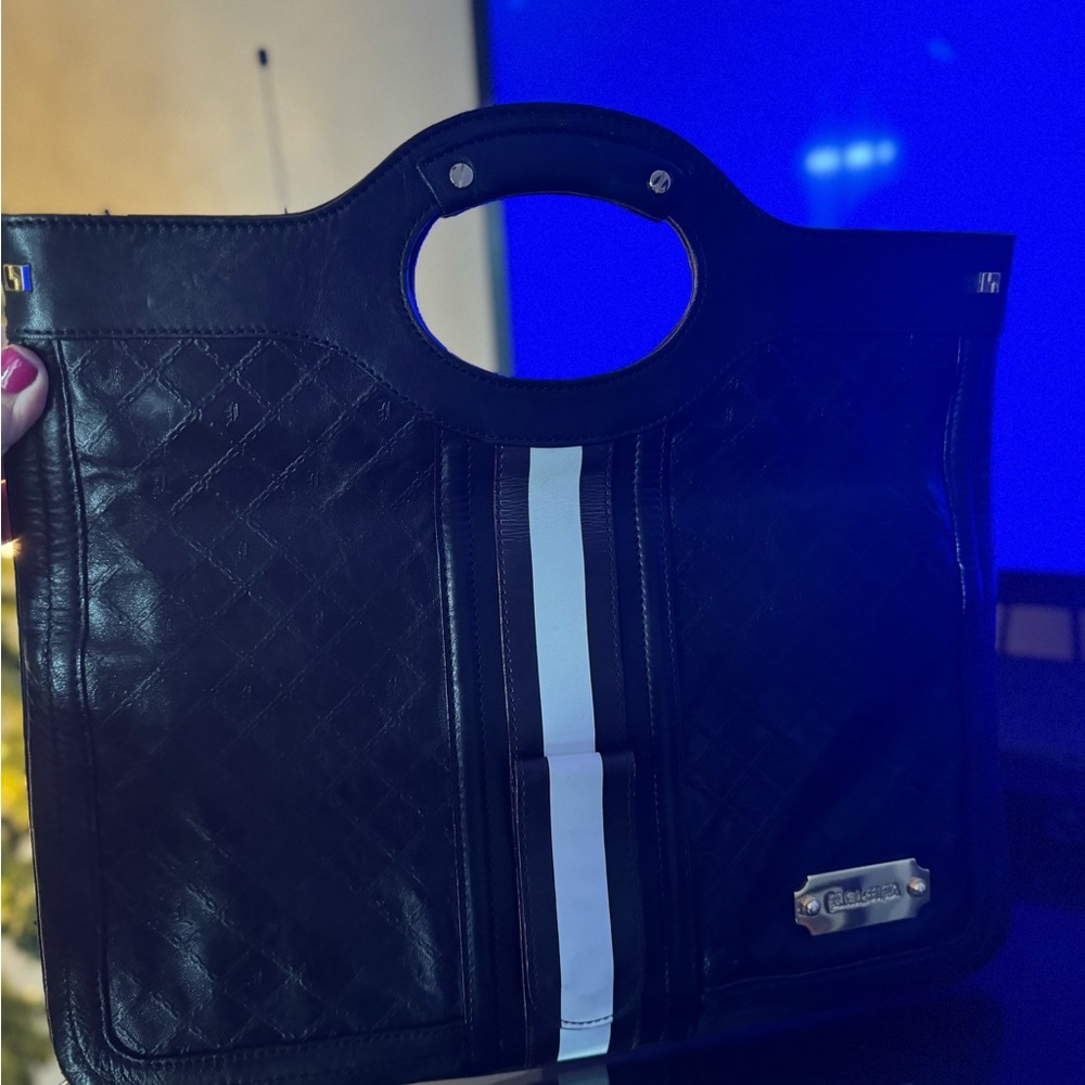 L.A.M.B. Black and White bag converts to folded clutch